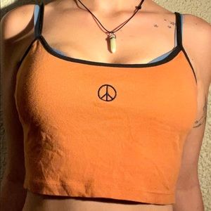 Urban Outfitters ‘Peace Sign’ Orange Crop Top
